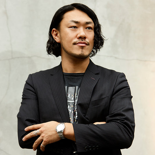十倍 直昭氏